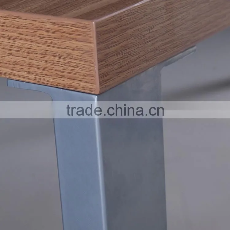 Long narrow stainless steel feet with wooden dining table