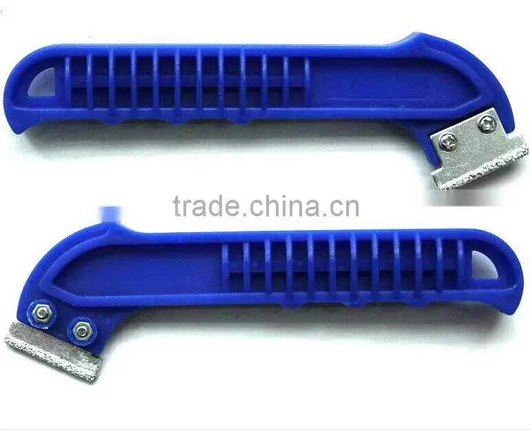 Tile grout removal saw with carbide grit edge