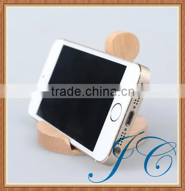 Man modeling wooden cell phone holder & mobile phone ring holder