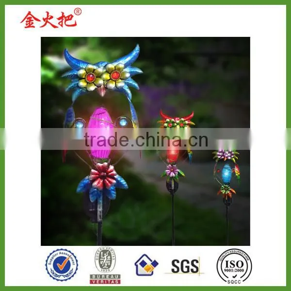 Metal bird welcome garden stake