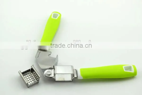 easy to use and clean stainless steel garlic press with soft handle