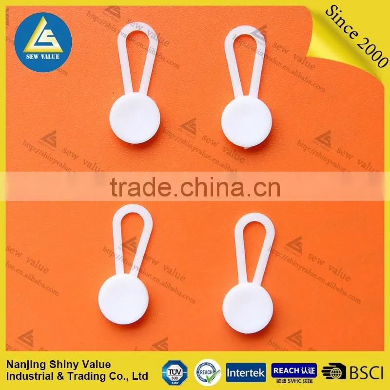 Plastic material shirt button extenders for easy fitting of your dress