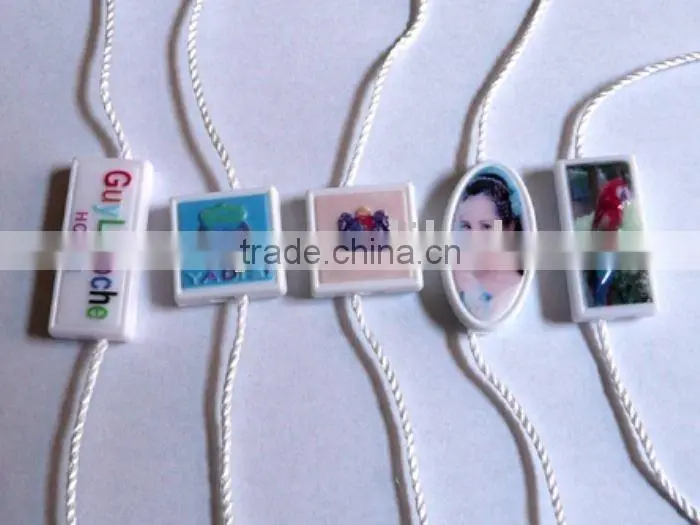 Alibaba China supplier custom made hang tag plastic string seal