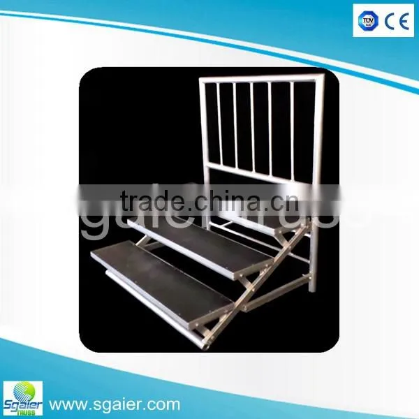 Auminum folding choral riser with plywood platforms