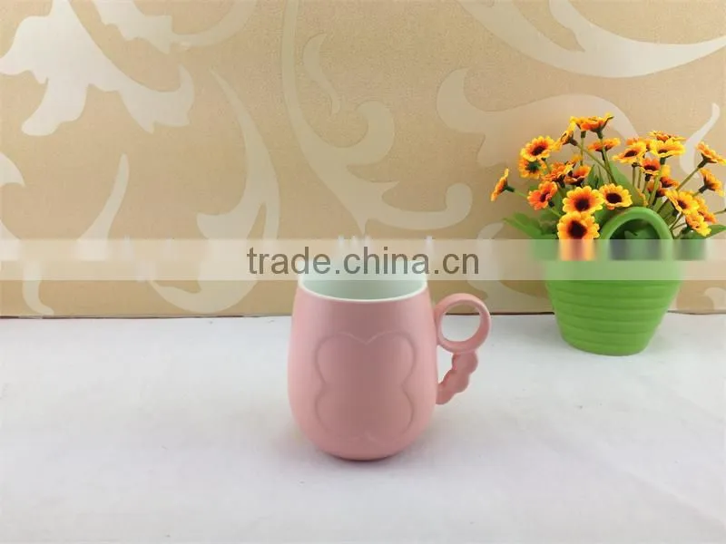 round handle embossed butterfly ceramic cup