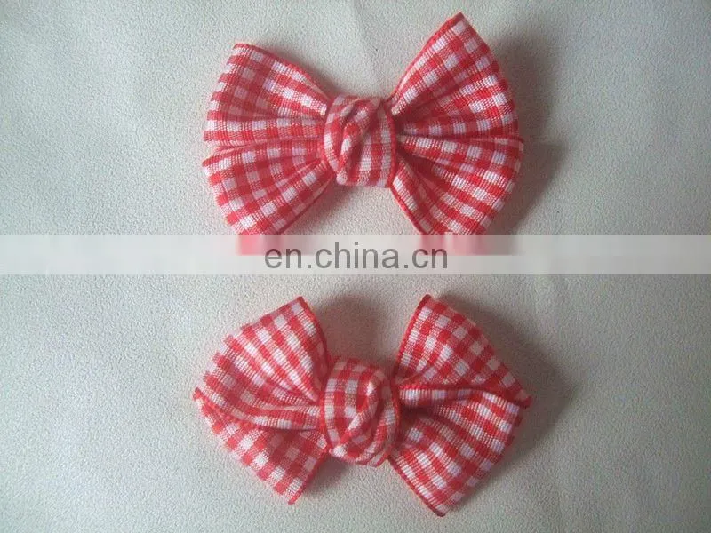 white bow tie for hair with spot