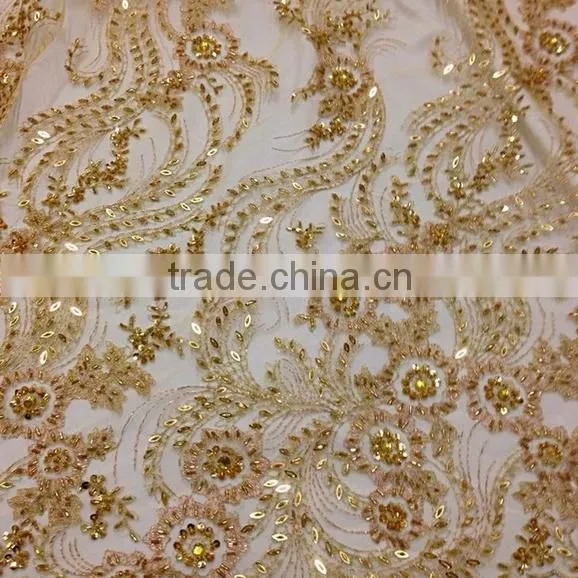 custom new arrival green metallic beaded stretch polyester sequined lace fabric for wedding dress garment