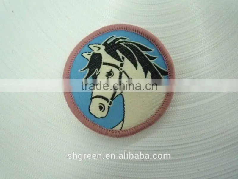 Round high density woven label with serging border for kids garment