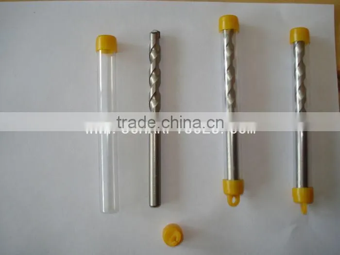 Twist drill bit with carbide tips