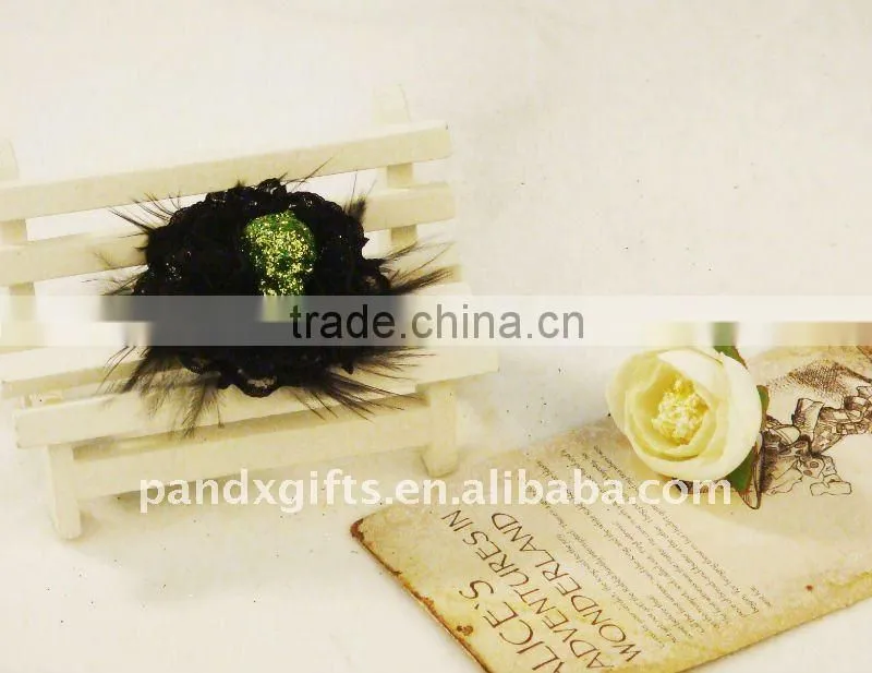 Green glittered skull adjustable ring with feather for masquade party