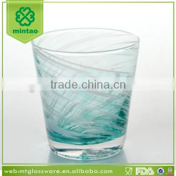 handmade mouthblown color glass tumbler with white decoration