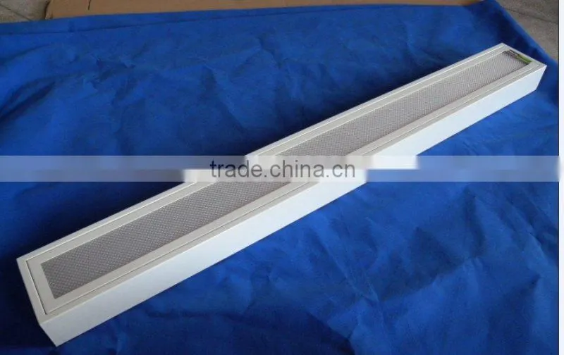 Fluorescent surface prismatic disffuser lighting fixture