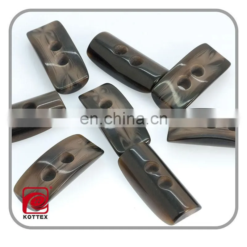 special shaped smooth surface resin imitation horn toggle buttons,2014 plastic toggle button,garment accessories