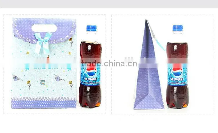blue button closure fancy wedding flavour paper gift bag