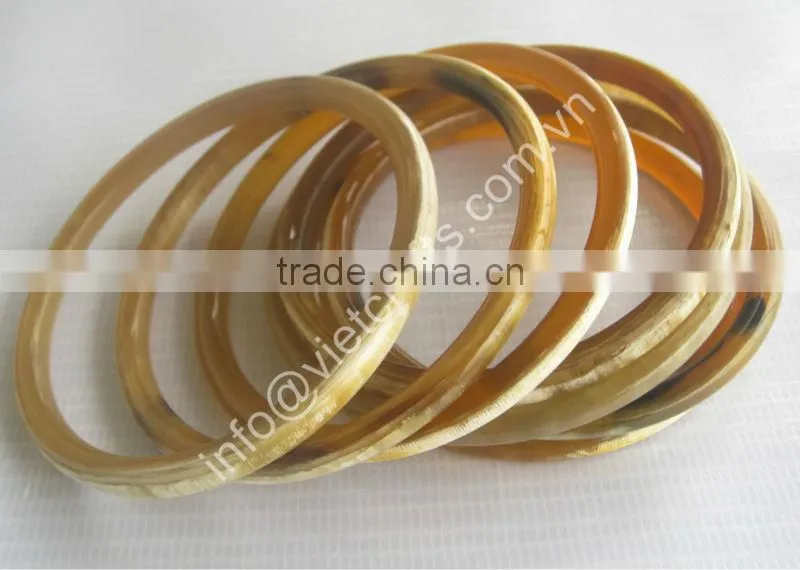 Buffalo horn bangle, natural horn vein, rounded shape - set of 7pcs