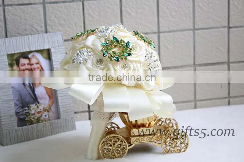 Romantic wedding bouquet full of crystal beads and green brooches