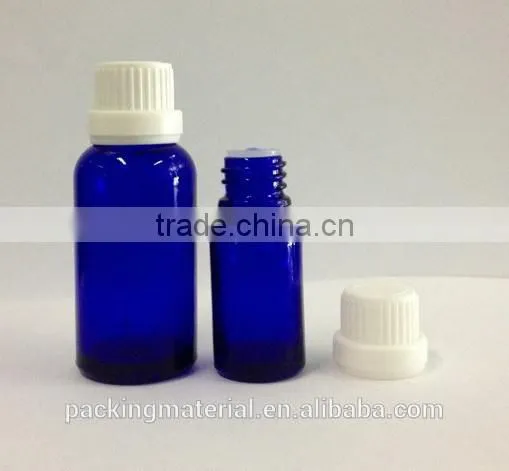 Essential oil glass bottle with tamper evident cap / childproof cap