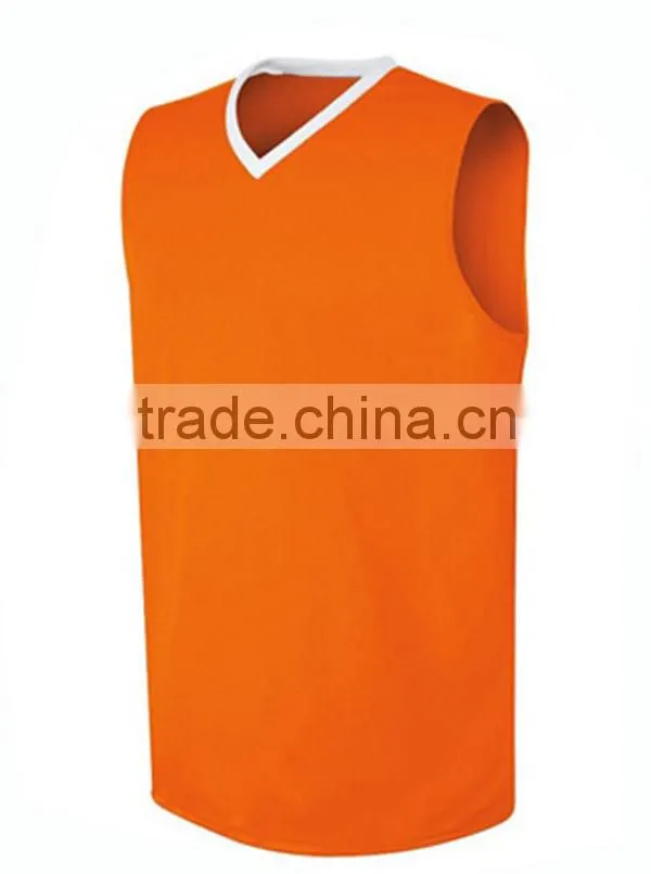 orange reversible basketball jersey with team name and player's number