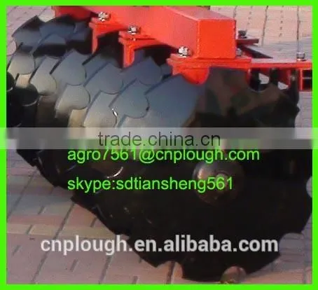 Notched disc harrow blade for agricultural harrow