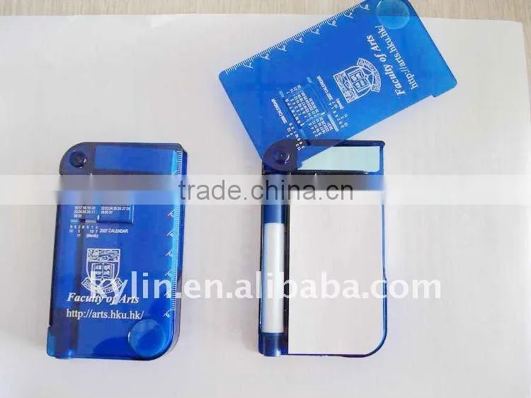 plastic notebook with calendar and pen
