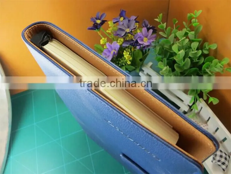 High quality promotional gift blue embossing pull up leather spiral notepad with pockets, pen holder and magnetic closure