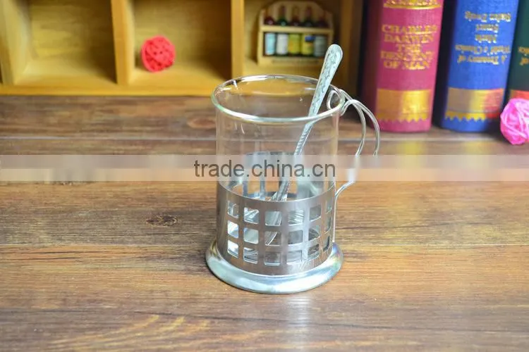 Glass coffee mug with stainless steel base handle