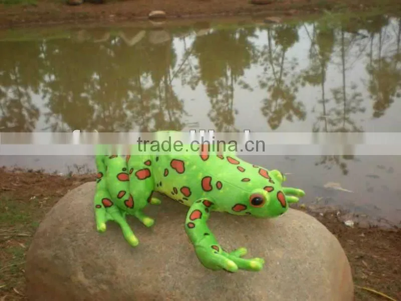 Realistic plush toy frog with spots