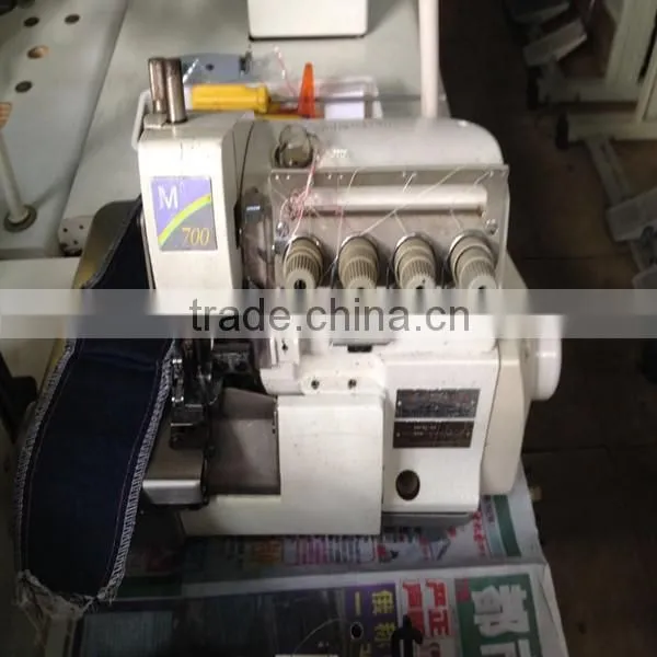 80% new typical lower noise high quality useful second hand pegasus M-700 four thread overlock indutrial sewing machine
