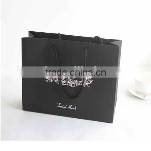 Luxury design shopping paper bag with gold hot foil logo