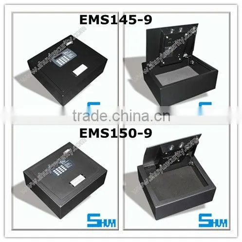 Top load hidden floor safe