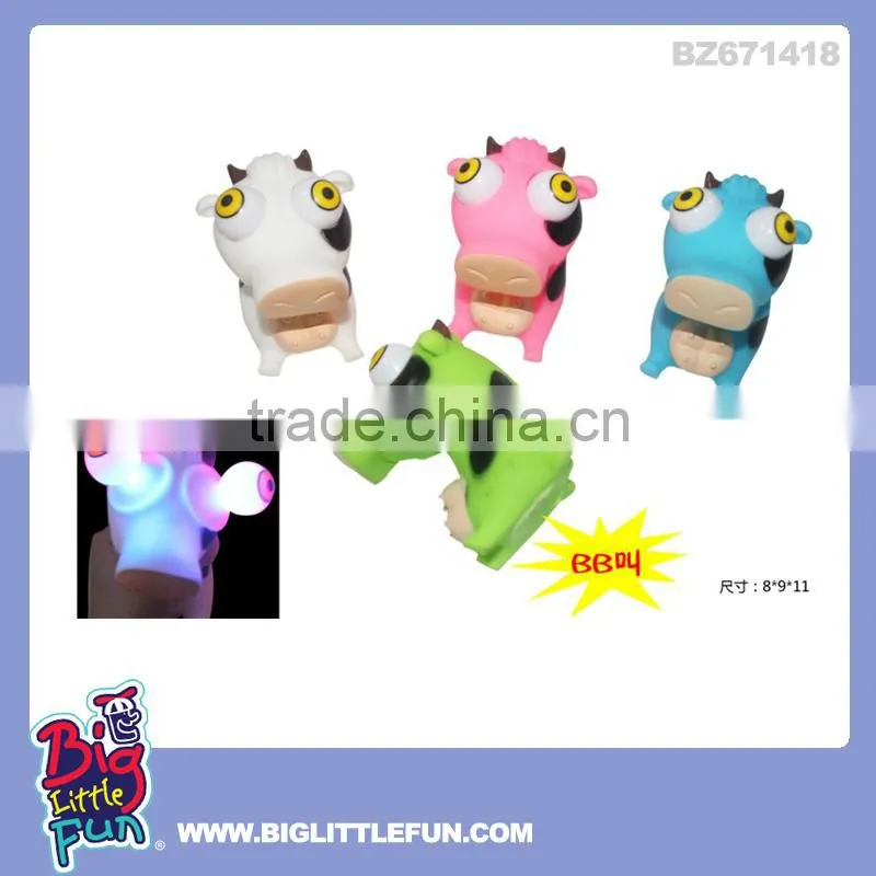 Eye pop squeeze toy rubber cow with light and BB sound