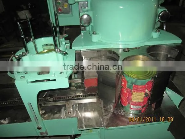 Automatic metal can seaming equipment