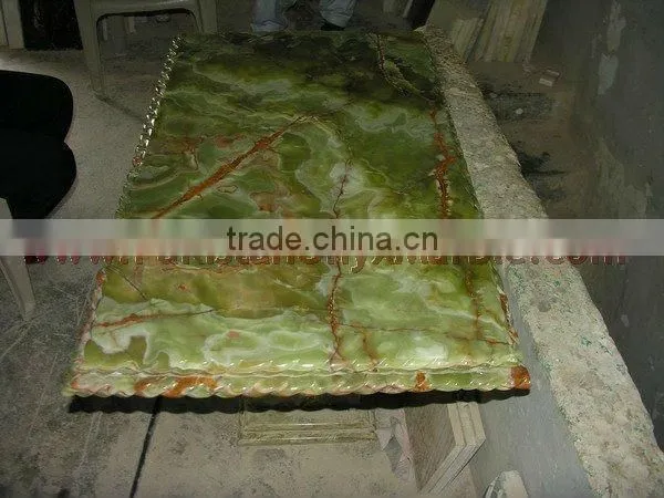 Natural color dark green onyx table