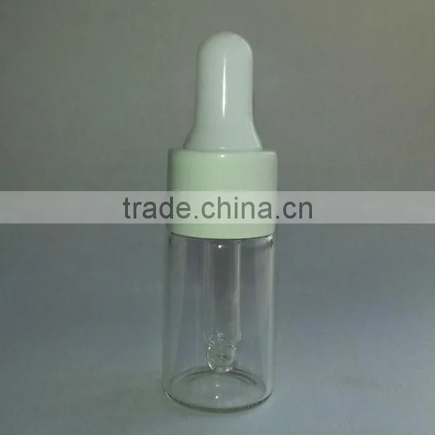 glass essential oil bottle with plastic cap and rubber dropper