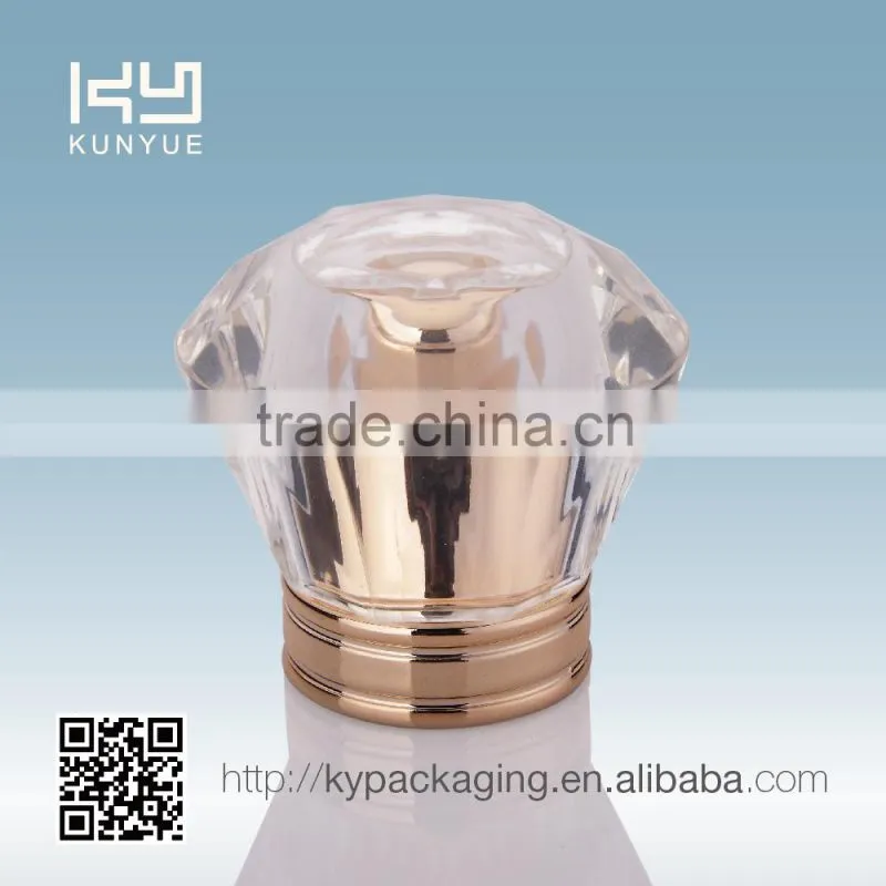 nice cristal shaped plastic perfume cap with uv gold insert