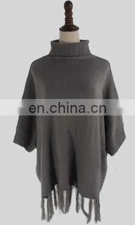 Ladies Trendy Crochet Fringe Poncho In Grey