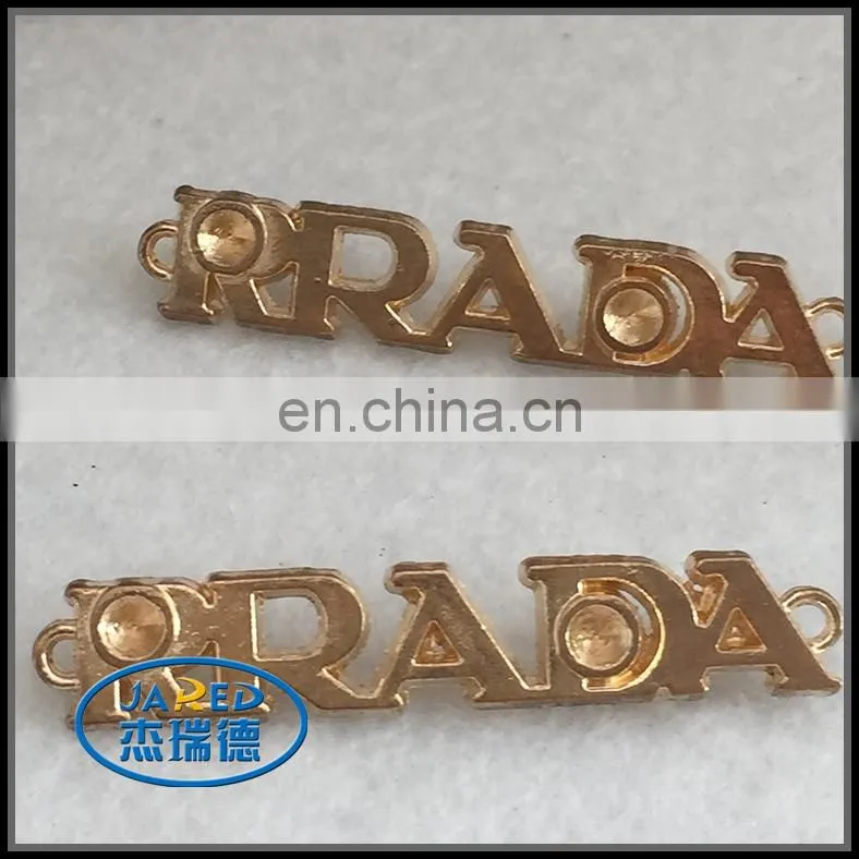 cangnan custom made cheap aluminum metal clothing badge/tag
