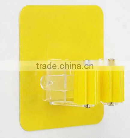 Wholesale Stock Magic Wall Suction Plastic Mop Handle Storage Holder