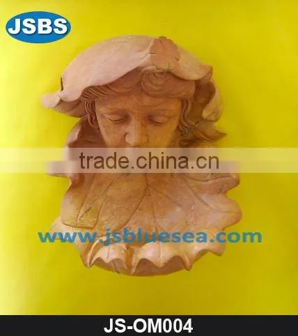 Polished marble nude lady statue in wall