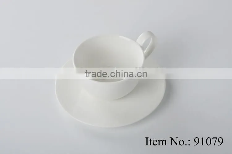 delicate fine porcelain coffee cup with saucer