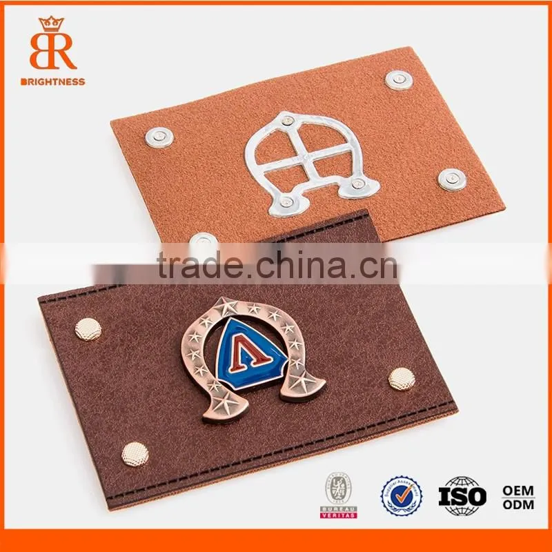 Personalized metal logo fashion style embroidery patch for hats embossed fake leather patch