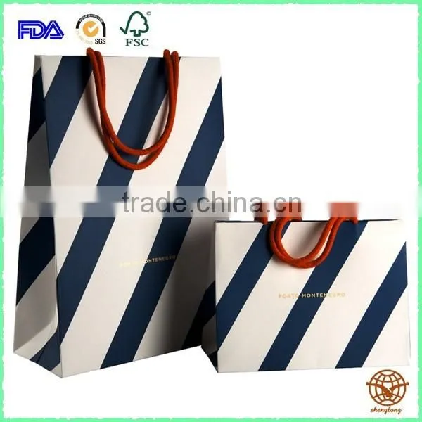 Custom bulk paperboard carrier with black Ribbon