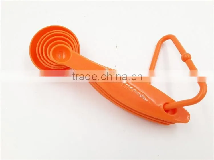 Plastic disposable measuring spoon