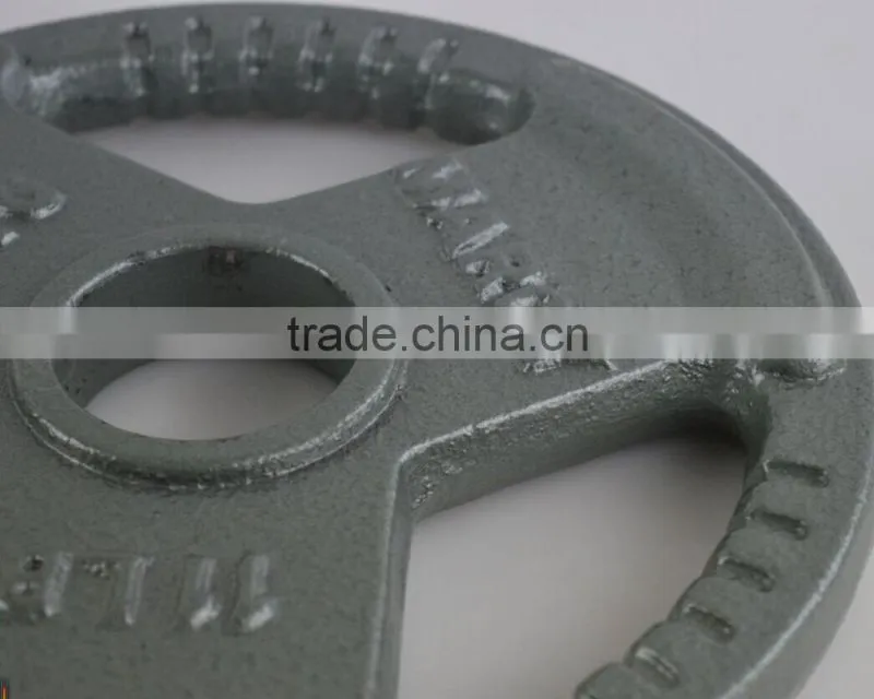 handle painting olympic barbell weight plate in weight lifting