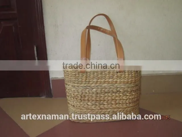 Eco-friendly water hyacinth handbag with handles, fashionable looking, good price, natural material from Vietnam