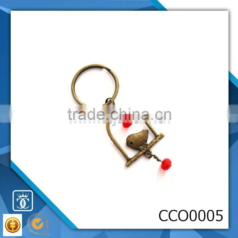 alibaba gold supplier china custom shaped metal keychain of bird cage