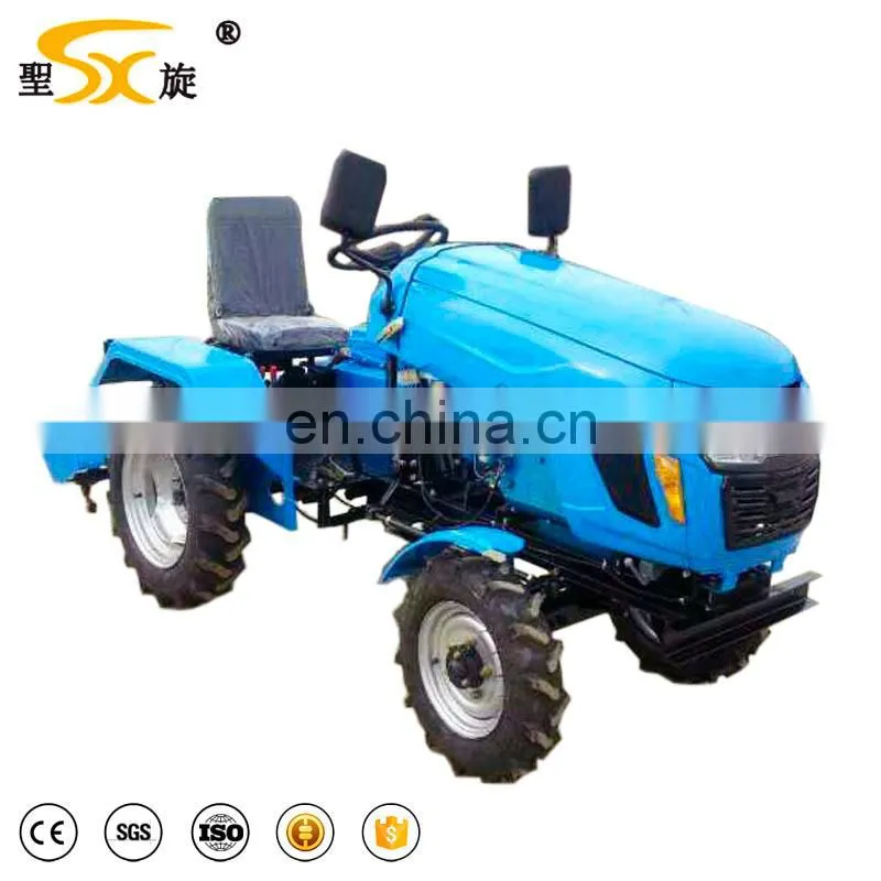 lawn equipment mini tractor with garden tools and implements