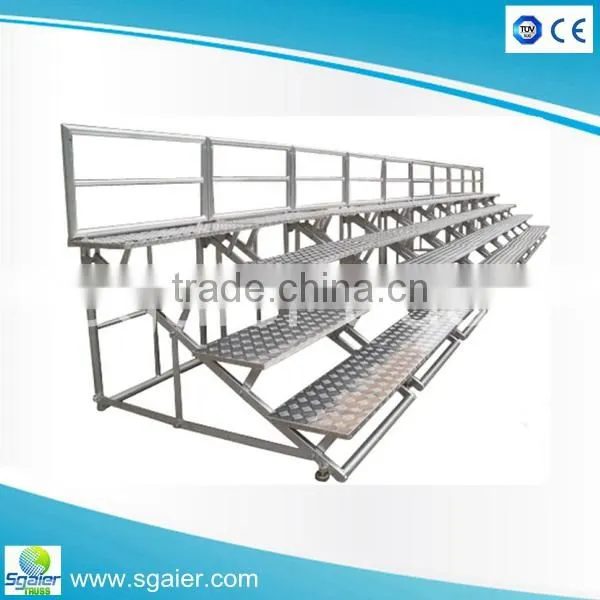 Auminum folding choral riser with plywood platforms