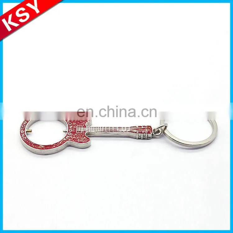 polished nickel key shape keychain
