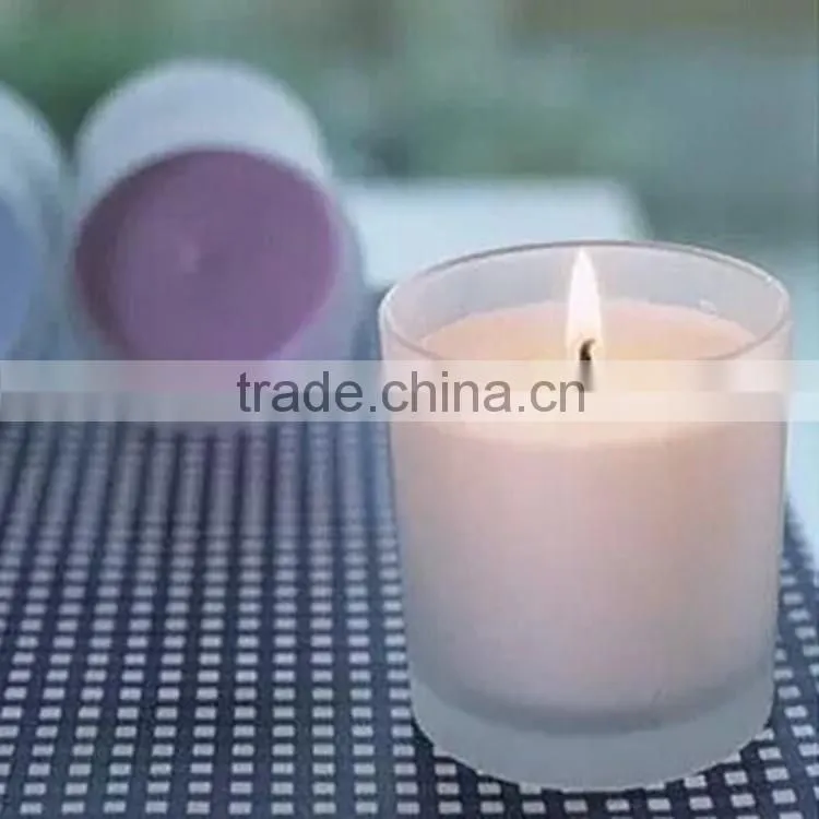 Multi-colored Luxury scented candle in glass jar
